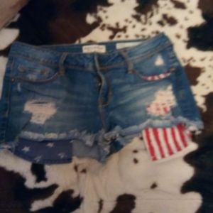 Denim cut-off shorts with American flag line pocke